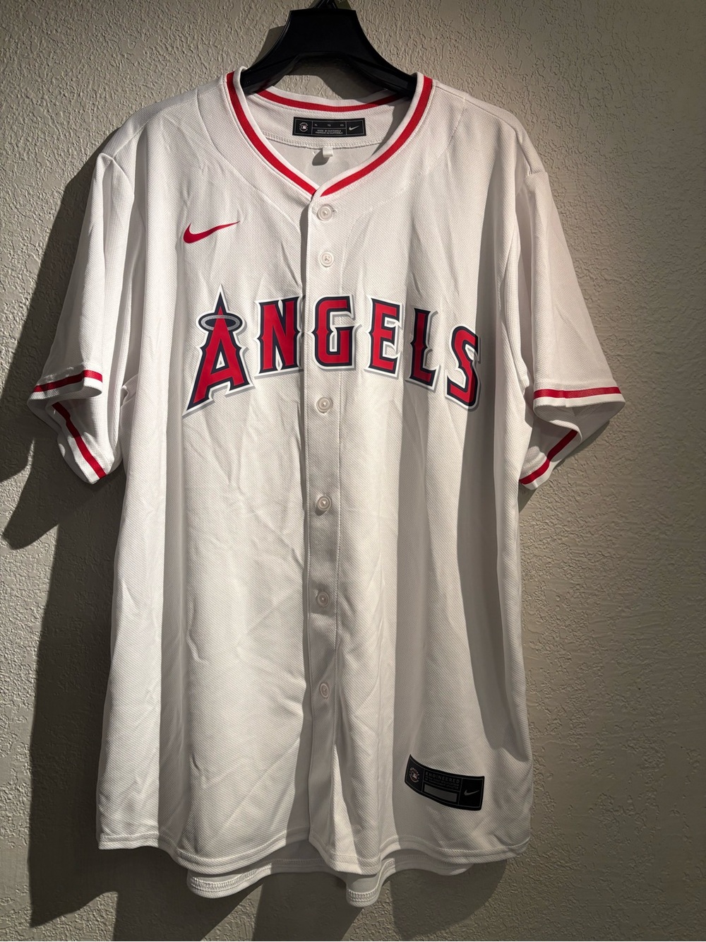 Nike White Baseball Jersey with Black Patch and Red Accent